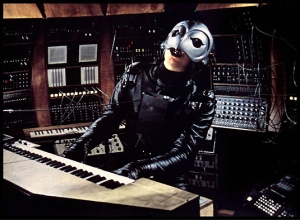 The Phantom Of The Paradise. He got his face caught in a record-pressing machine.
